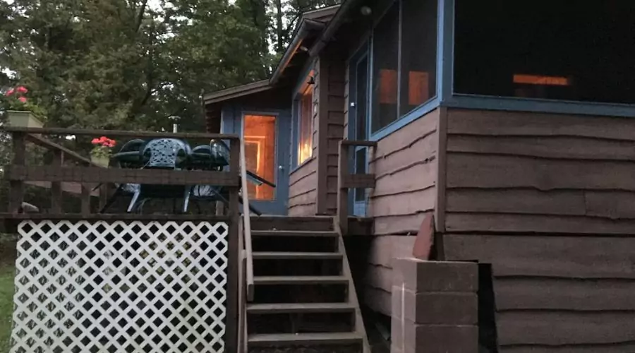 Authentic seasonal 1950s Adirondack live edge /knotty Pine waterfront cabin